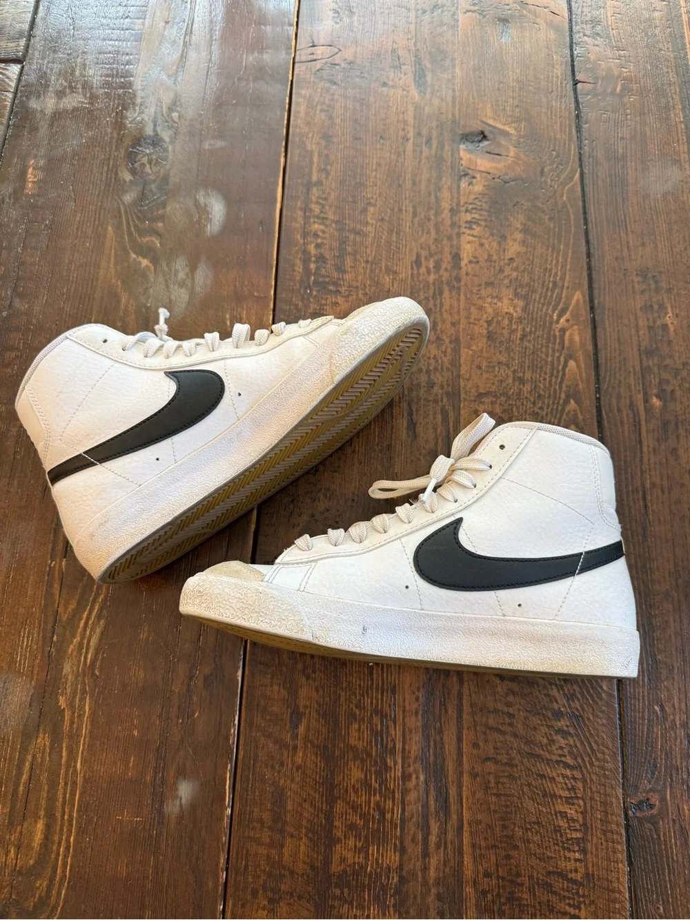 Nike Blazer White High-Top Sneakers with Black Swoosh and Cream Accents